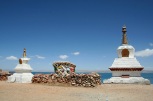 stupas at the lake